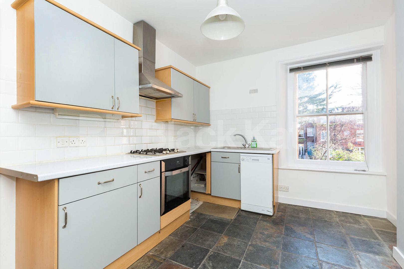 Set on the top floor of a period conversion with high ceilings and exposed brick Rathcoole Gardens, Crouch End